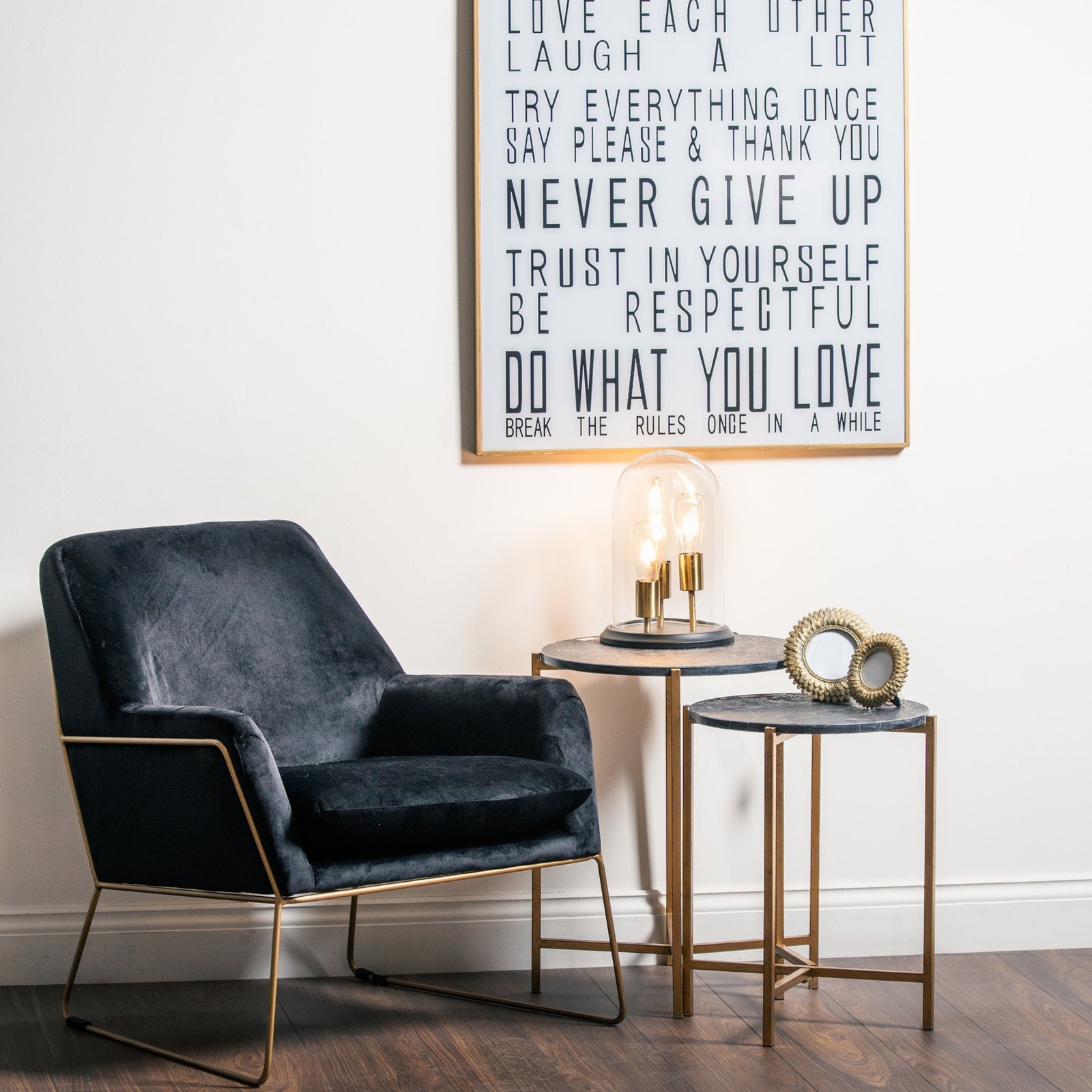 Set of two gold and black marble nesting side tables