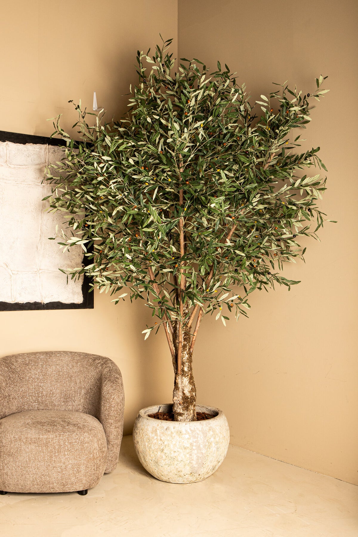 Faux olive tree in plastic pot, green