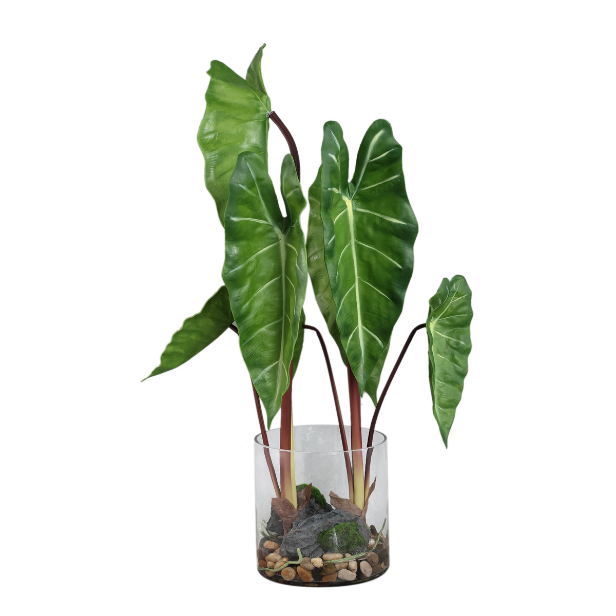 Leaves faux green plant in a glass vase