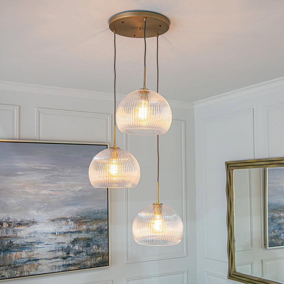 Astley Three Pendant in Antique Brass