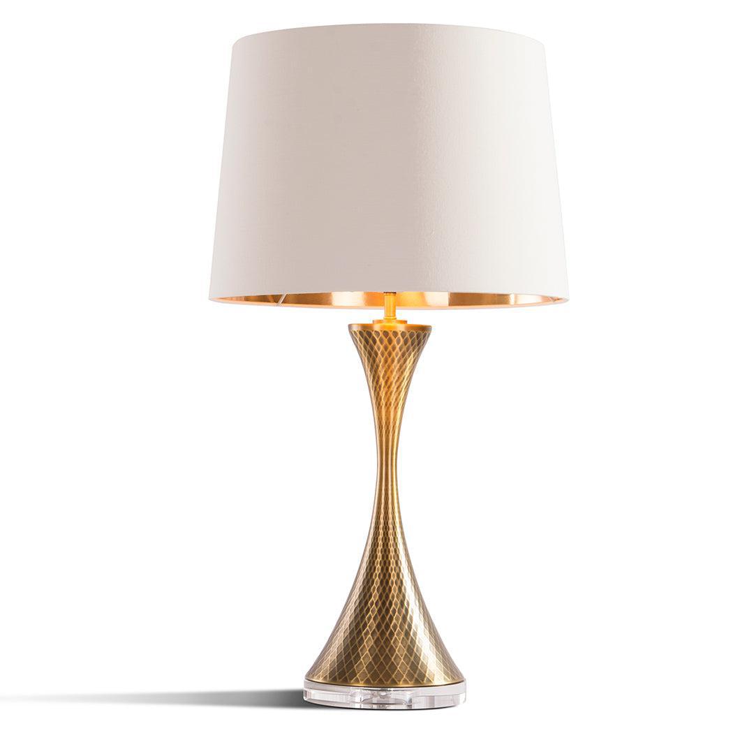 Decorative table lamp with gold base and white shade