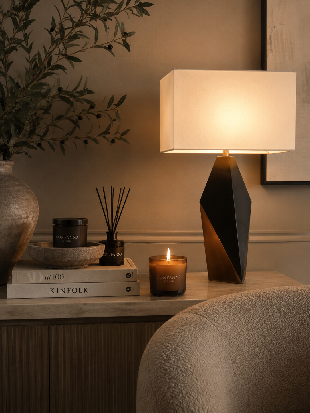 Marble and brass table lamp on a console — Conpanna Living