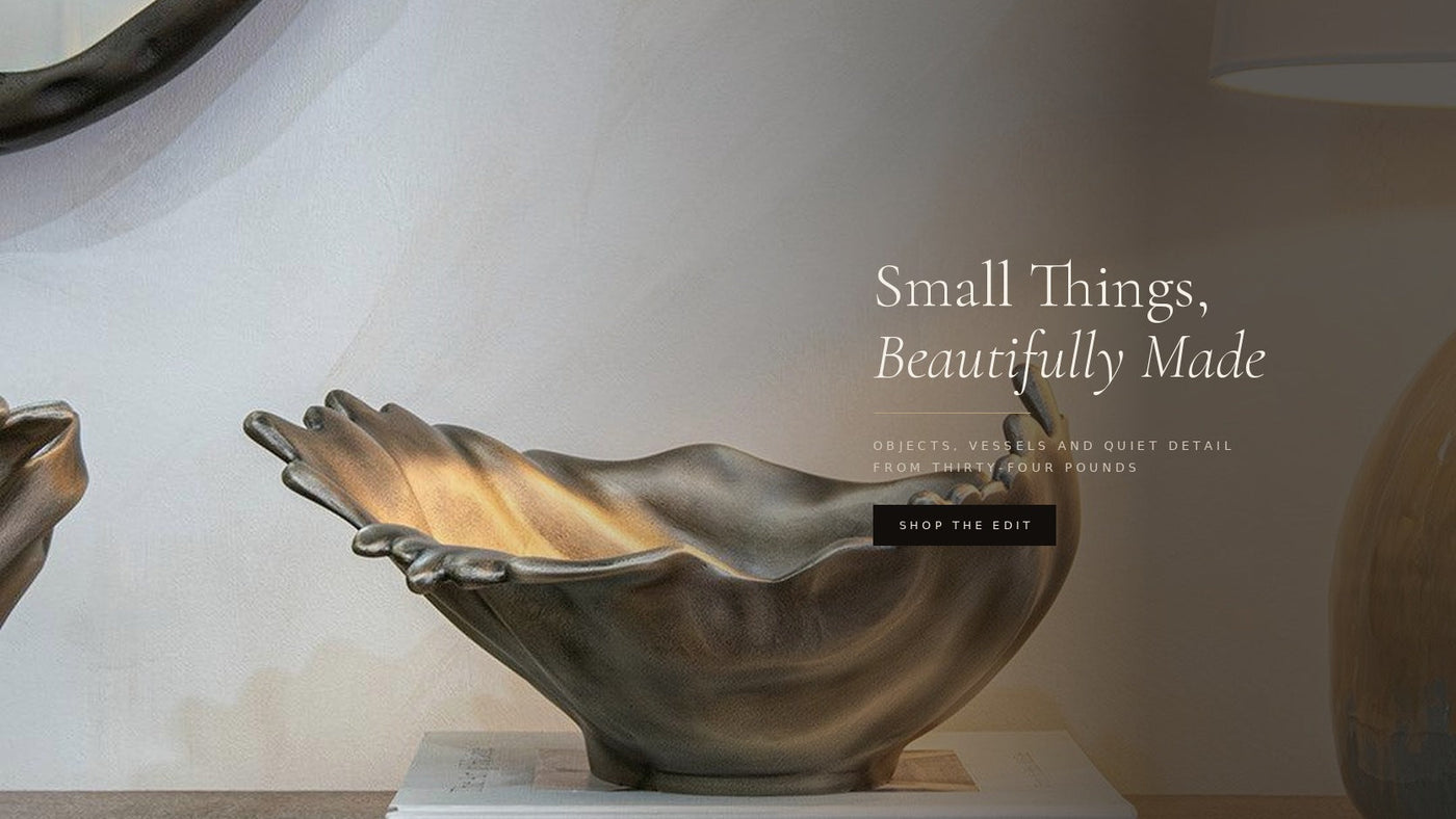 Antique brass shell bowl styled on books — Small Things, Beautifully Made