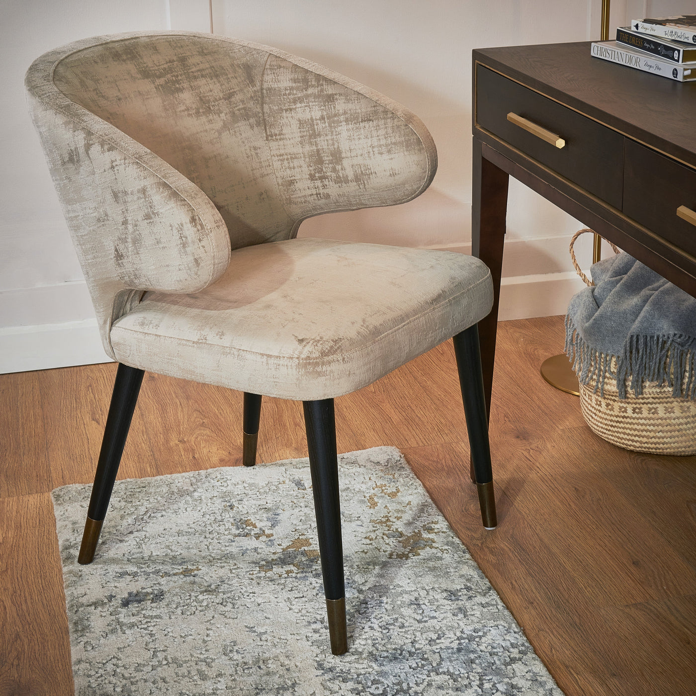 Champagne velvet accent chair styled by a desk — Conpanna Living