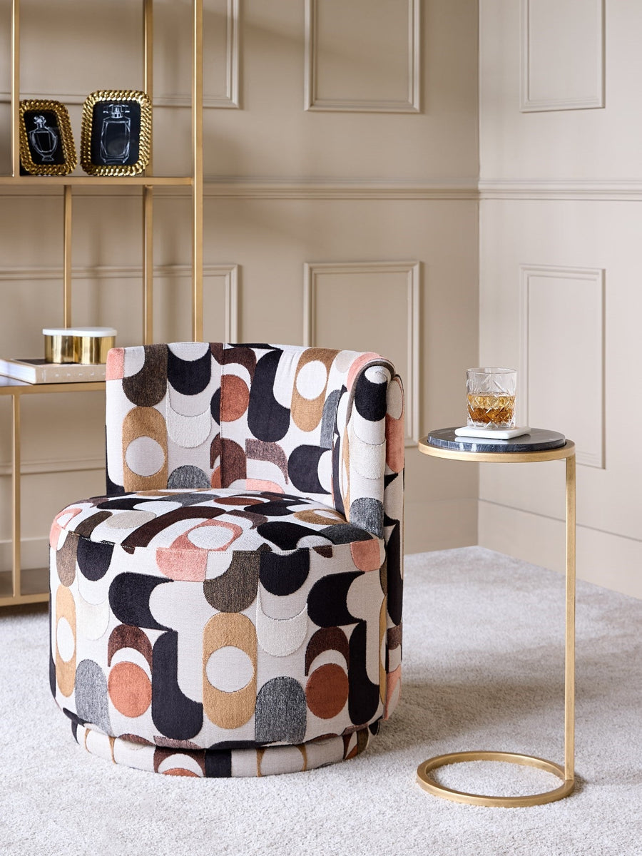 Champagne velvet accent chair styled by a desk — Conpanna Living