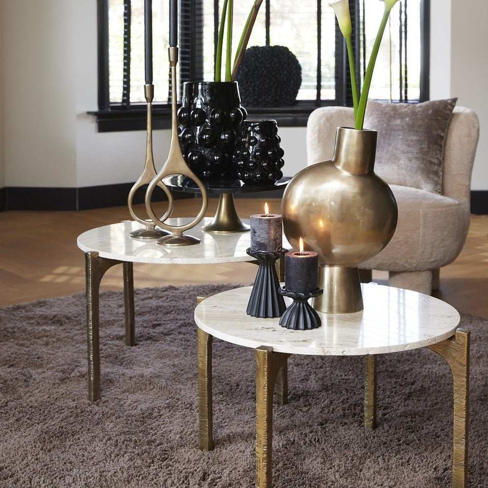 Dark marble round coffee table with a bouclé sofa — Conpanna Living