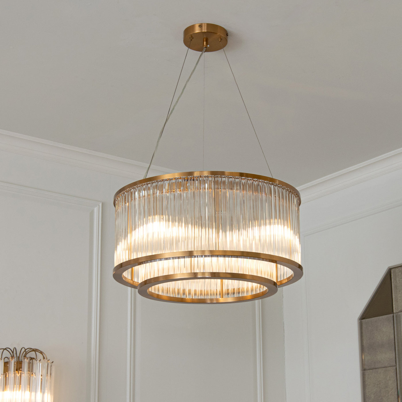 Designer drum pendant light in a panelled room — Conpanna Living