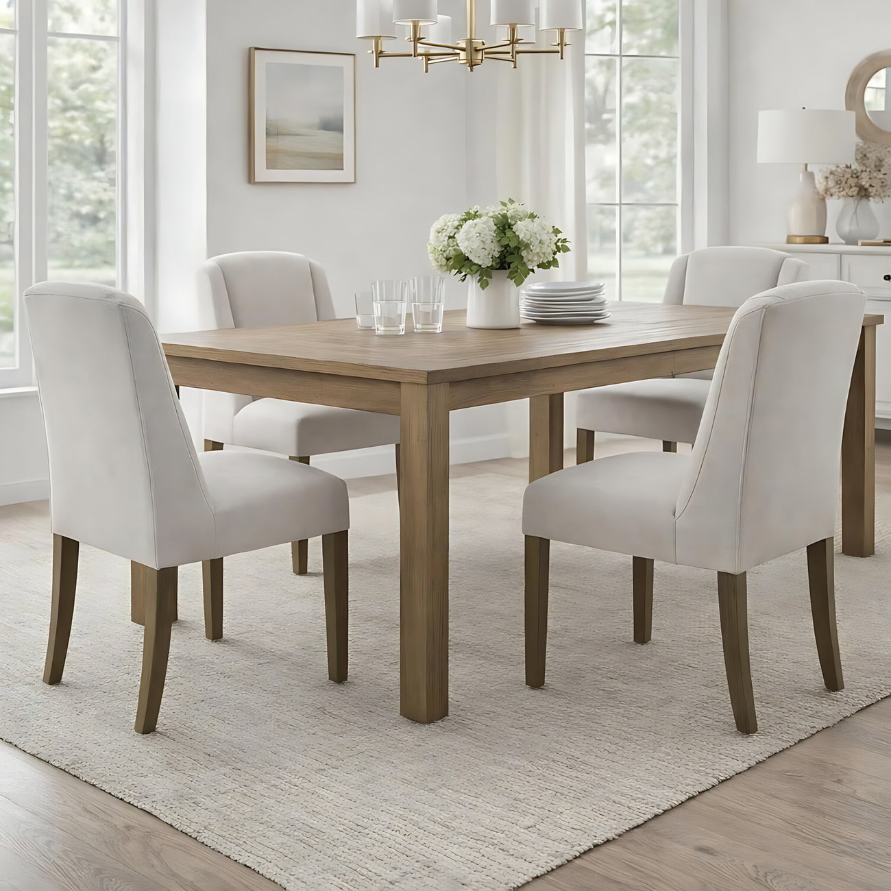Compton dining chair upholstered in oatmeal twill with wooden legs