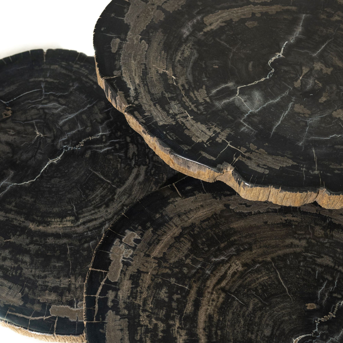 New Khine black petrified wood-effect round coffee table