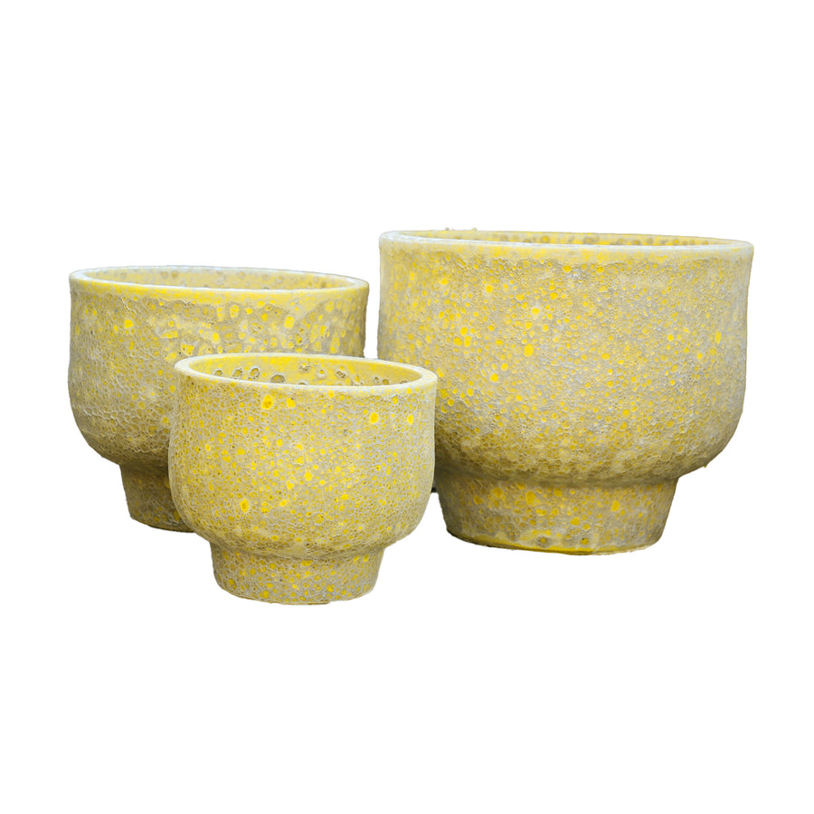 Sanish yellow glazed ceramic pot on textured foot