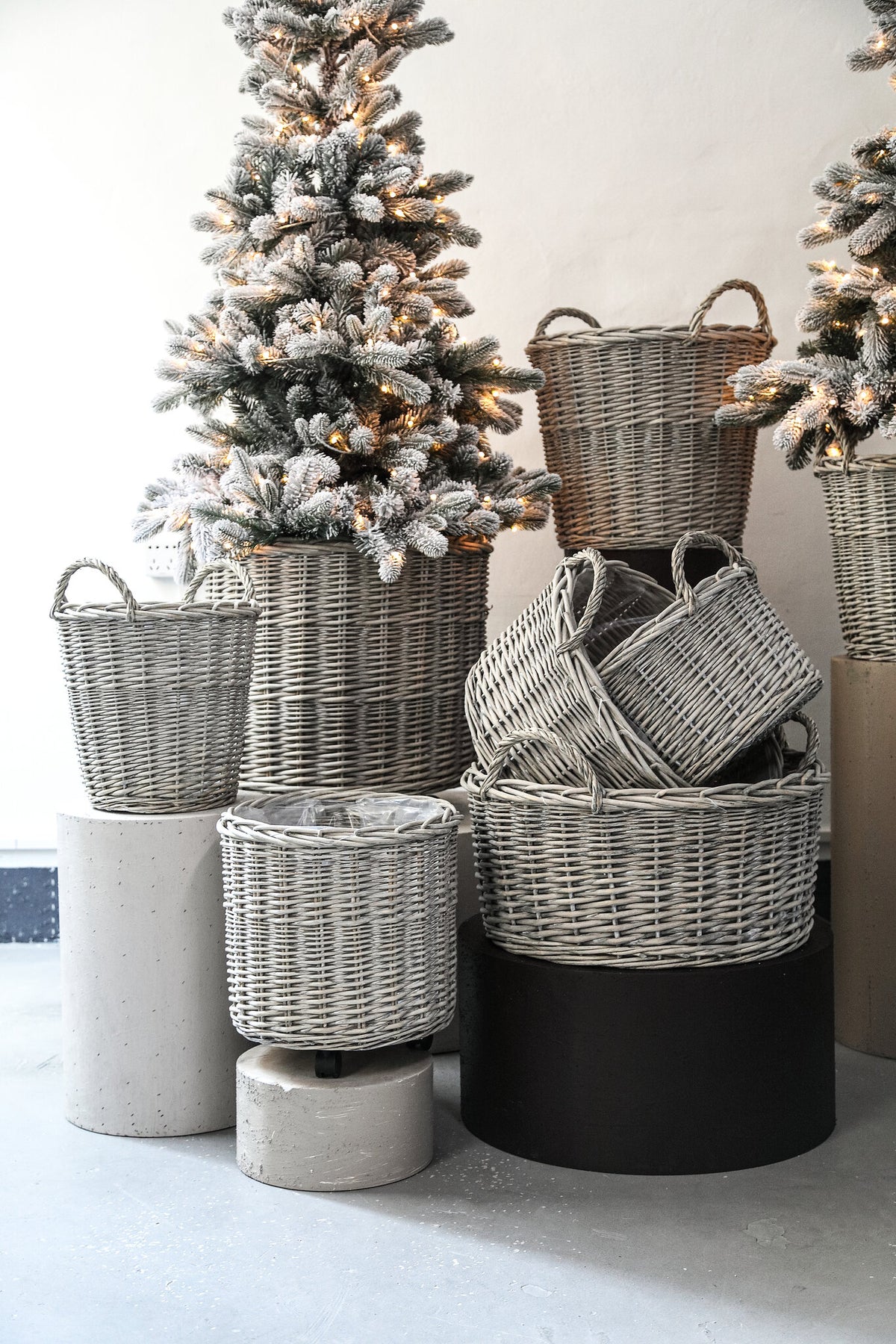 Linsey beige woven willow basket on wheels, small