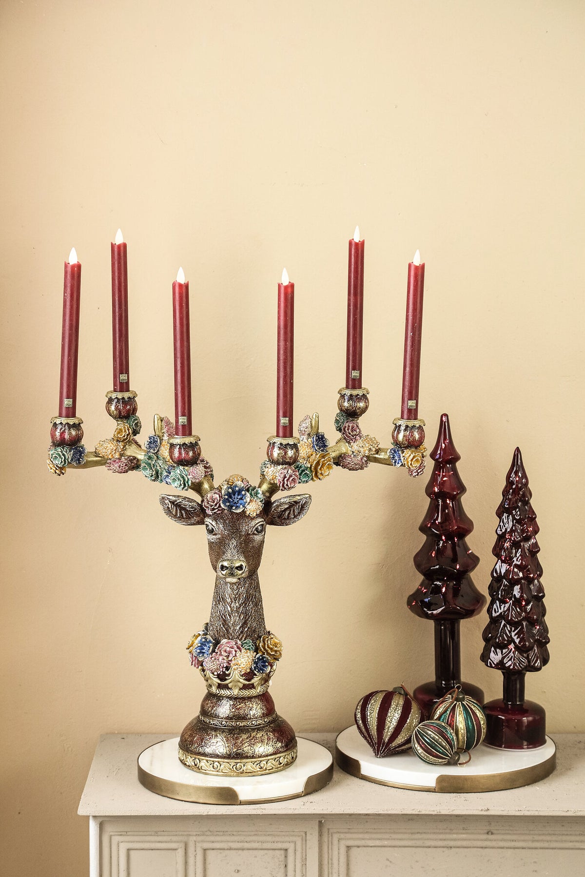 Deane burgundy polyresin reindeer candle holder with flowers