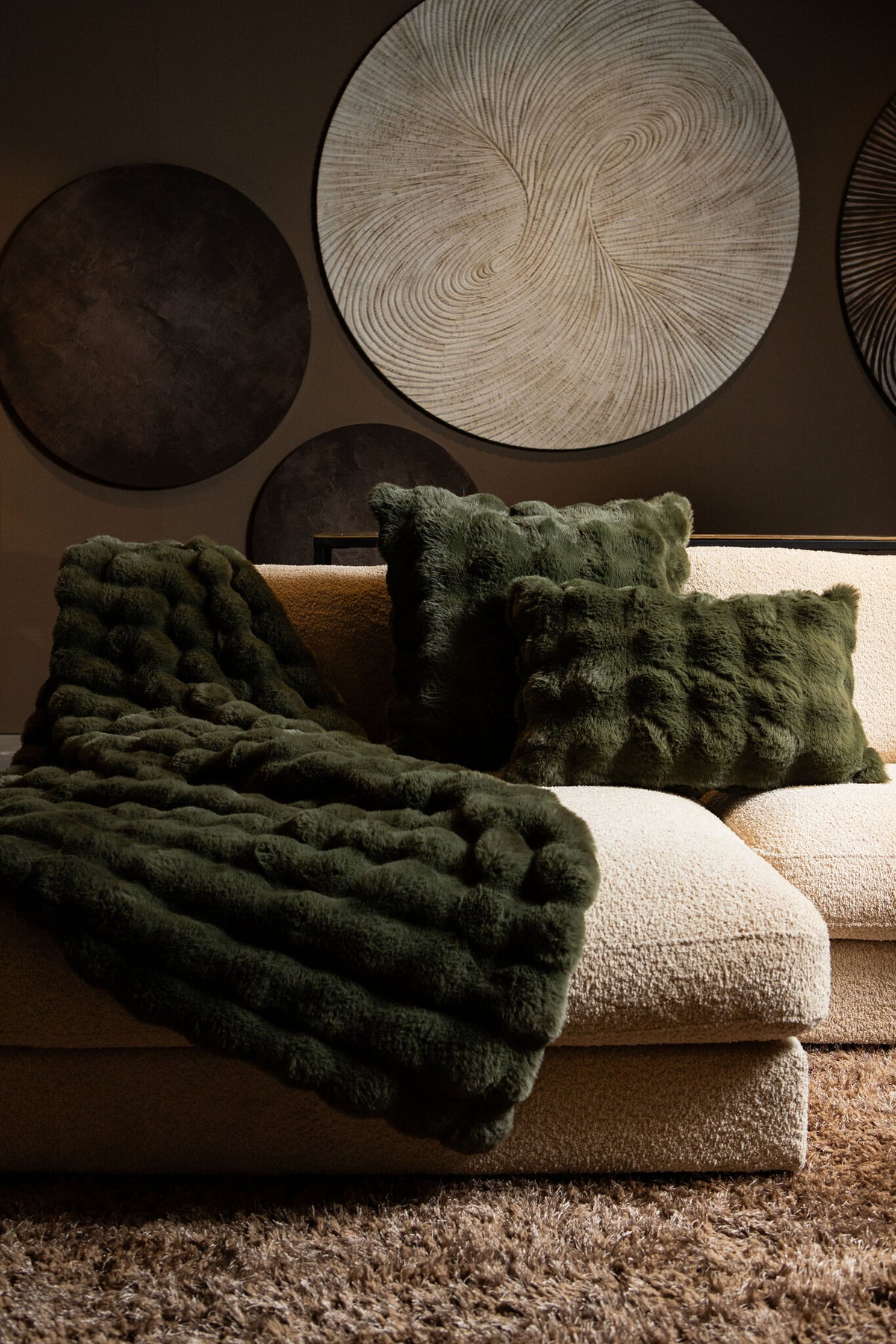 Dunae moss green faux fur throw with dotted pattern