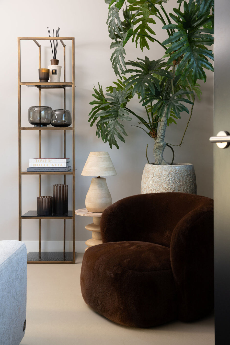 Aphrodite dark brown fur armchair, rounded silhouette