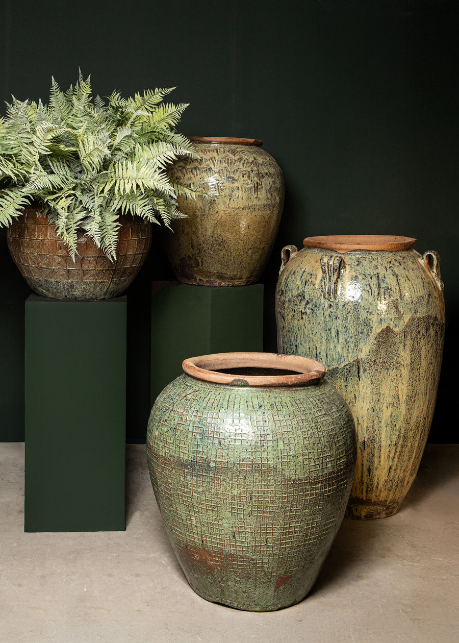 Lisie natural ceramic planter with blue pyramid pattern, tapered