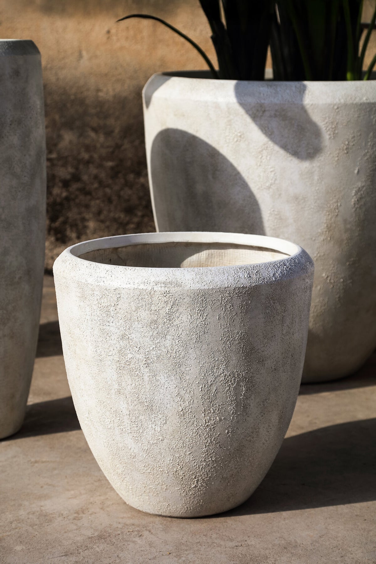 Dashima cream GRC bombay planters, set of four