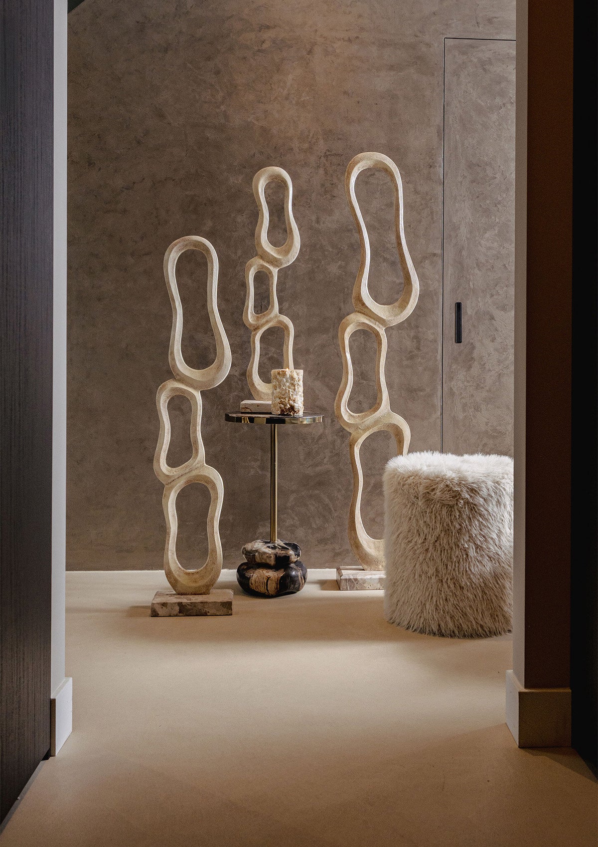 Camare beige abstract aluminium sculpture on marble base, medium