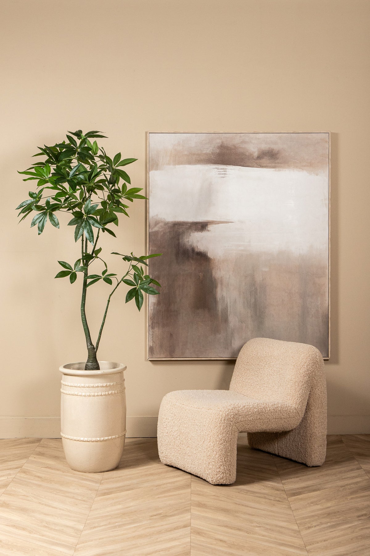 Faux pachira plant in weighted pot