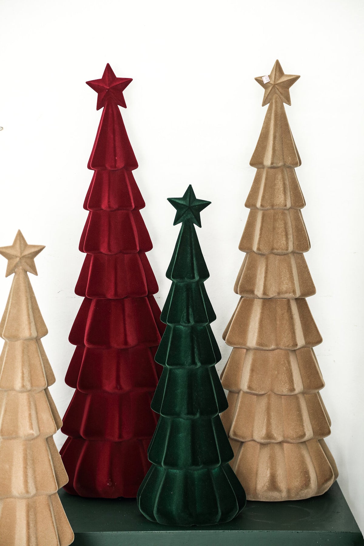 Yule dark green flocked layered tree statue, large