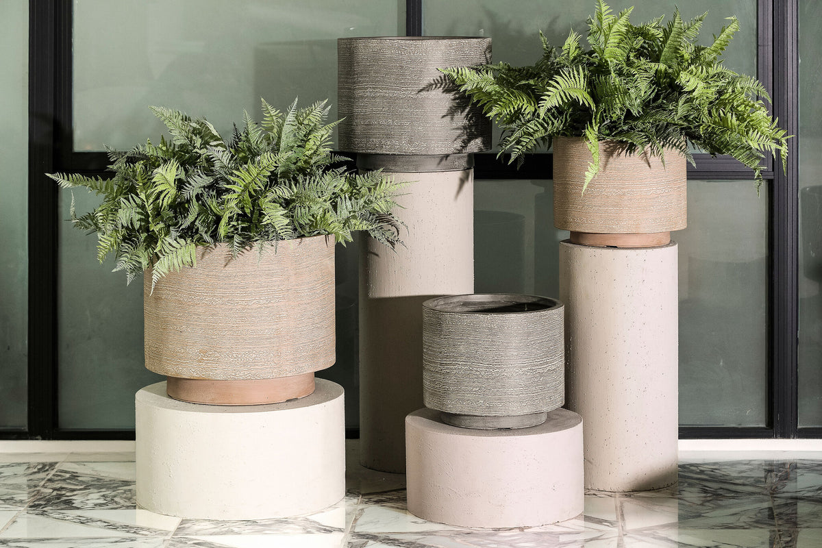 Melynn light brown round planter on foot