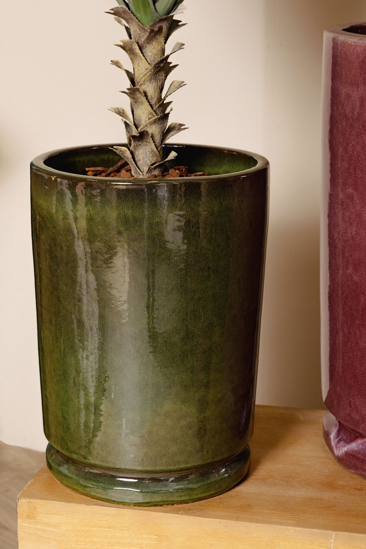 Madsen dark green ceramic planter, high