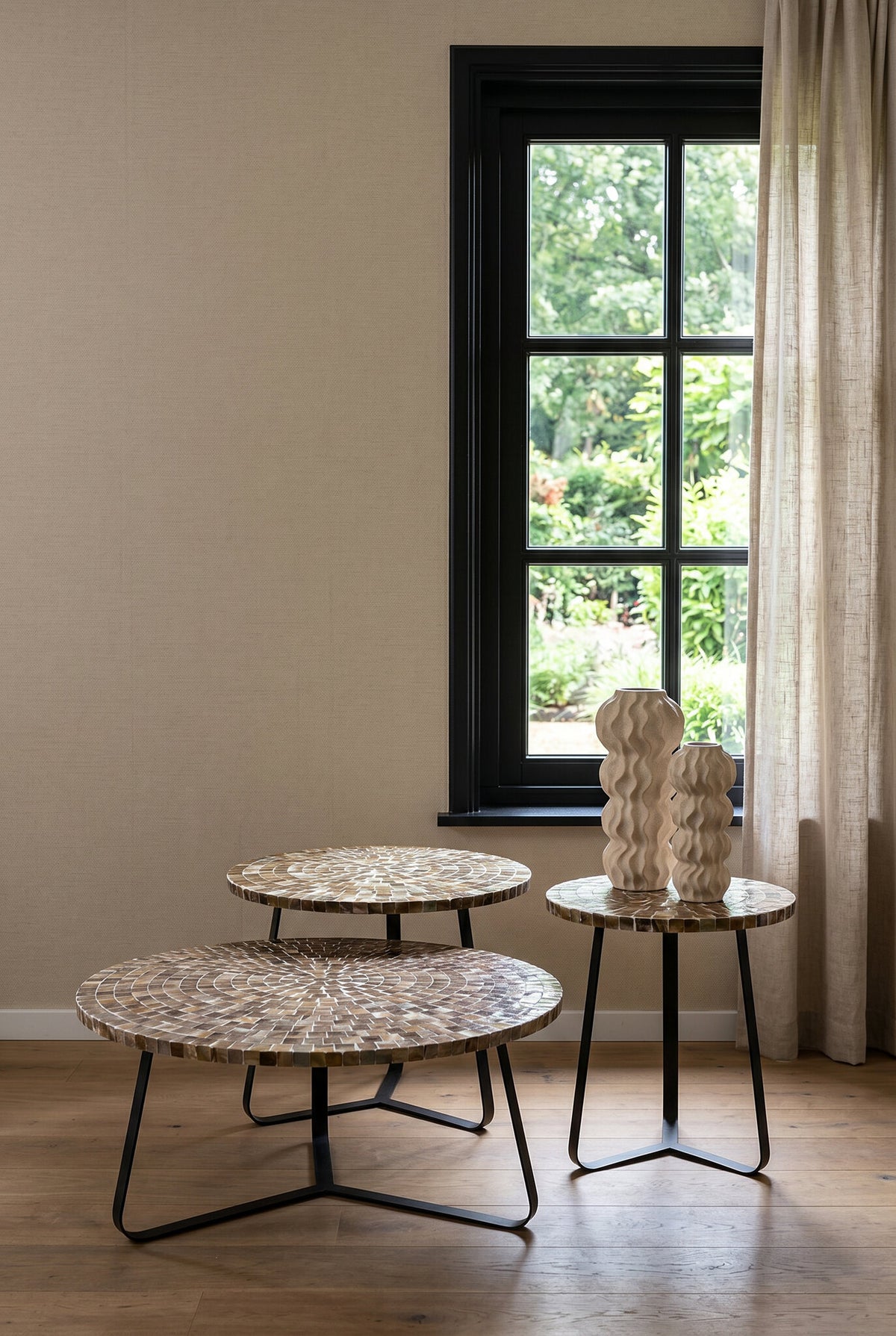 Kenzy bronze capiz shell round coffee table