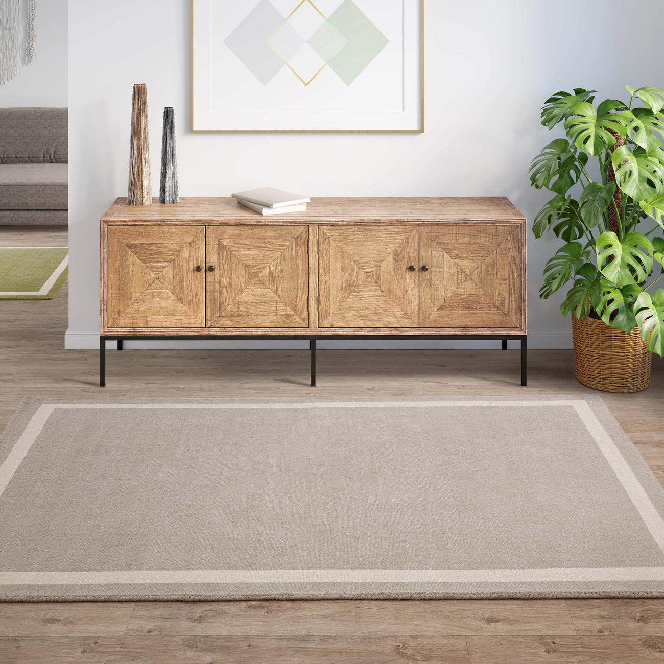 Albi Sand Border wool rug styled in a lifestyle room setting