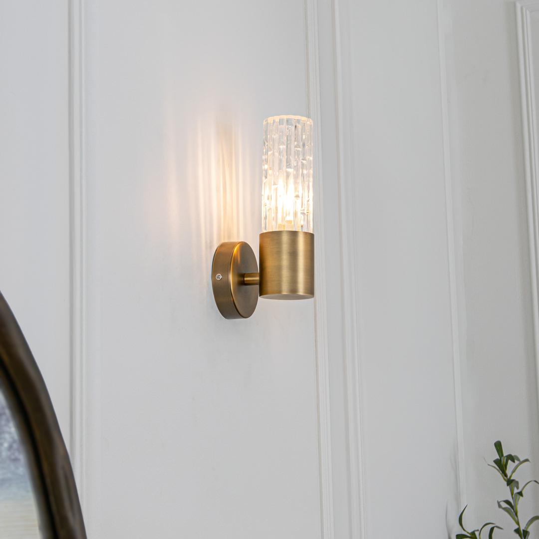 Ansley Wall Lamp in brass — front view