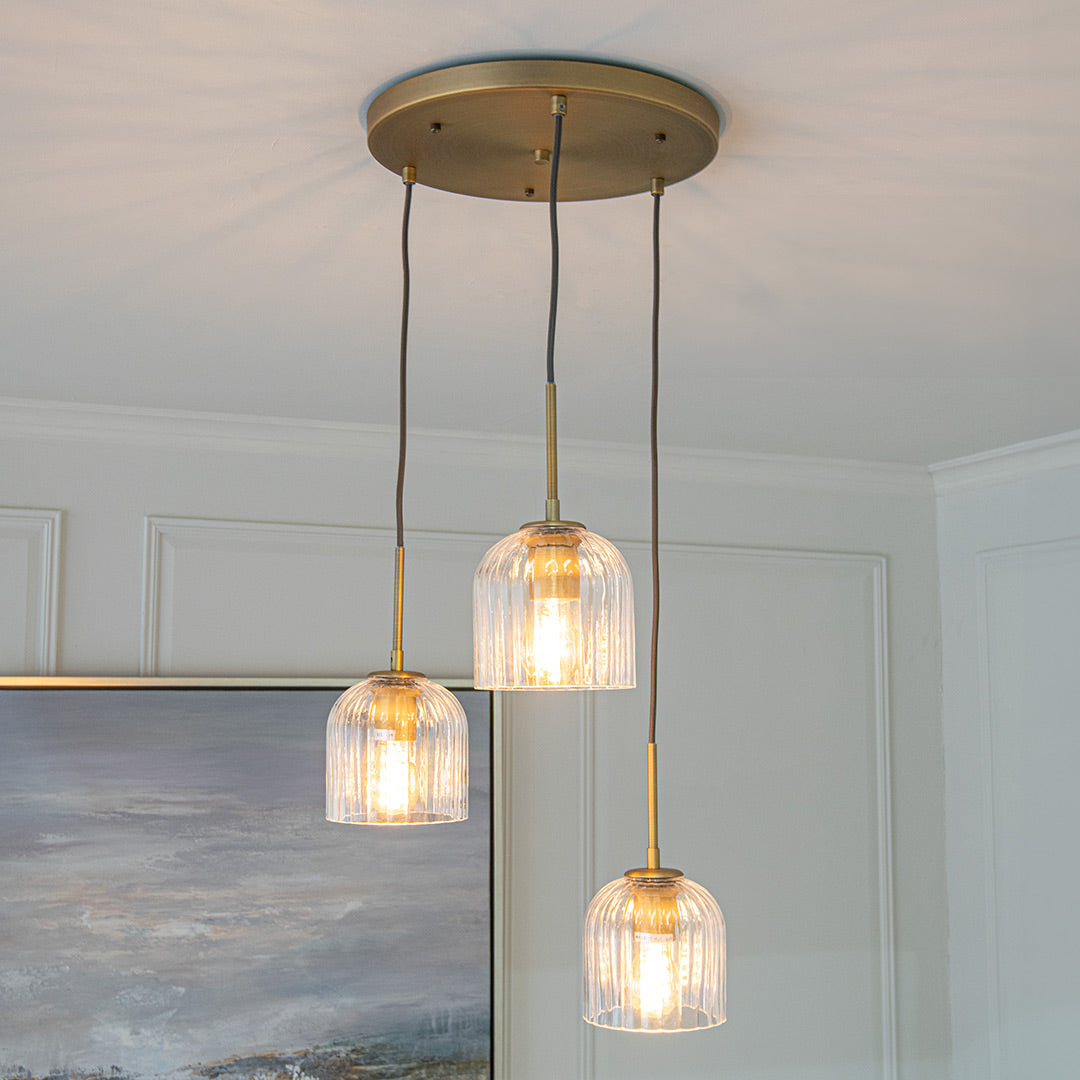 Astley Three Pendant in Antique Brass