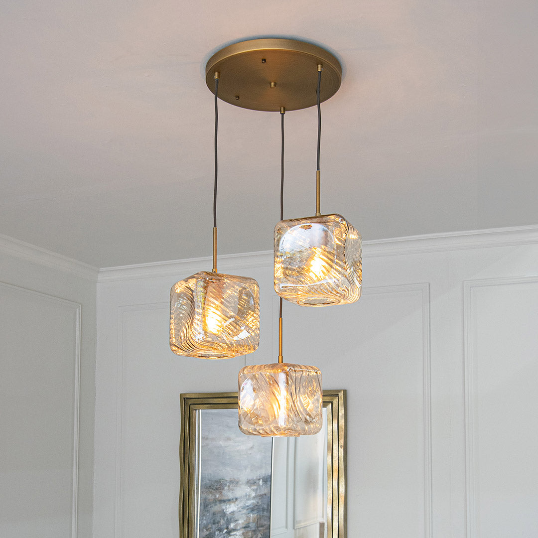 Astley Three Pendant in Antique Brass