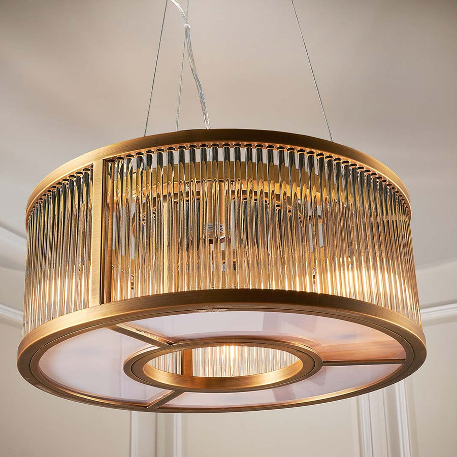 Aston Cylinder Brass Pendant Light in antique brass and clear — detail