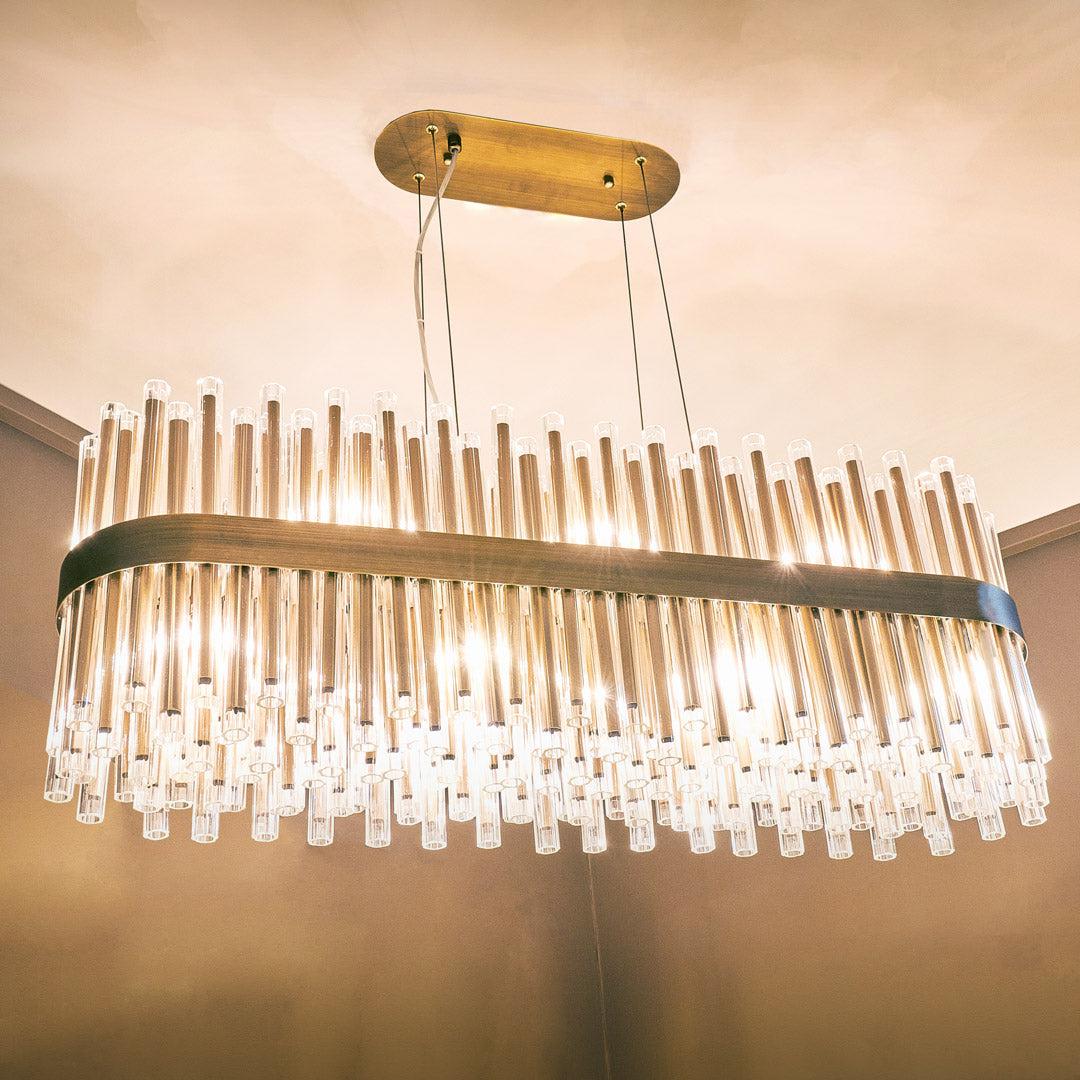 Colmar Long Chandelier in brass and clear — alternative angle
