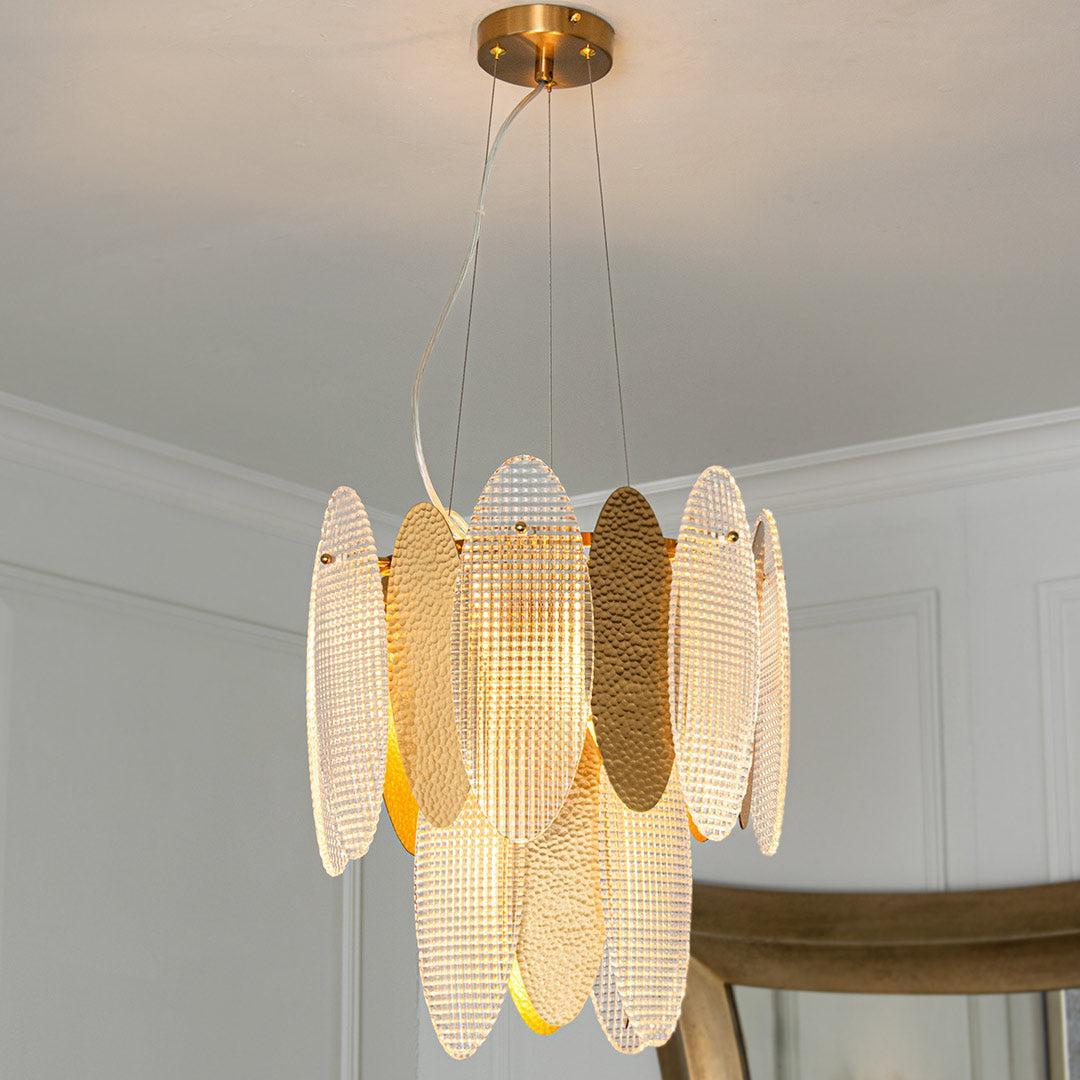 Elsa Chandelier in antique brass — front view