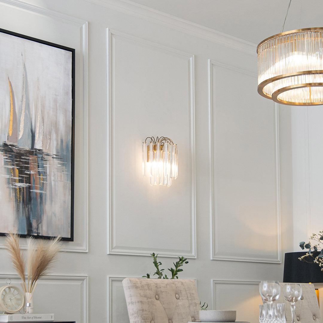 Ira Wall Light in antique brass — front view