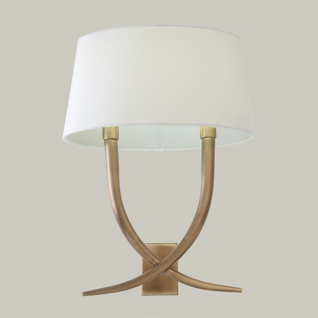 Iva Wall Lamp in antique brass and cream — front view