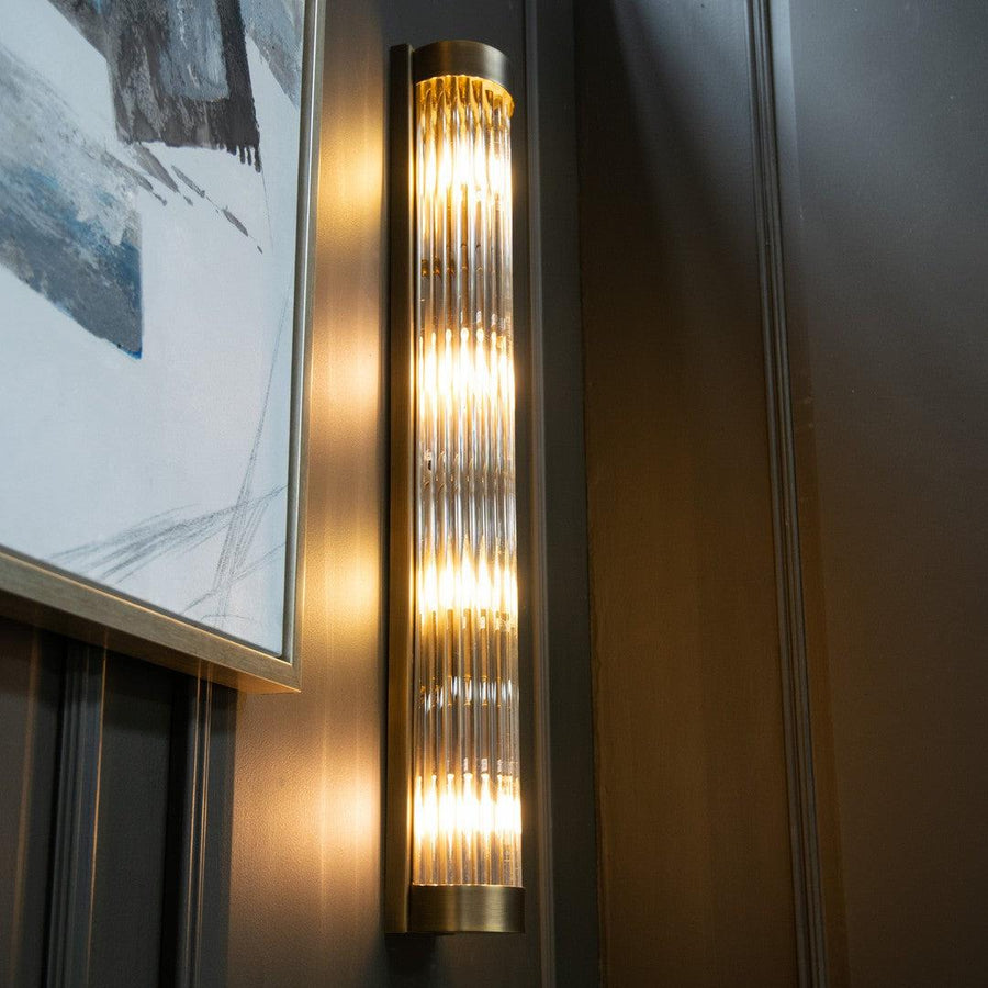 Nasir Long Wall Lamp in antique brass — detail