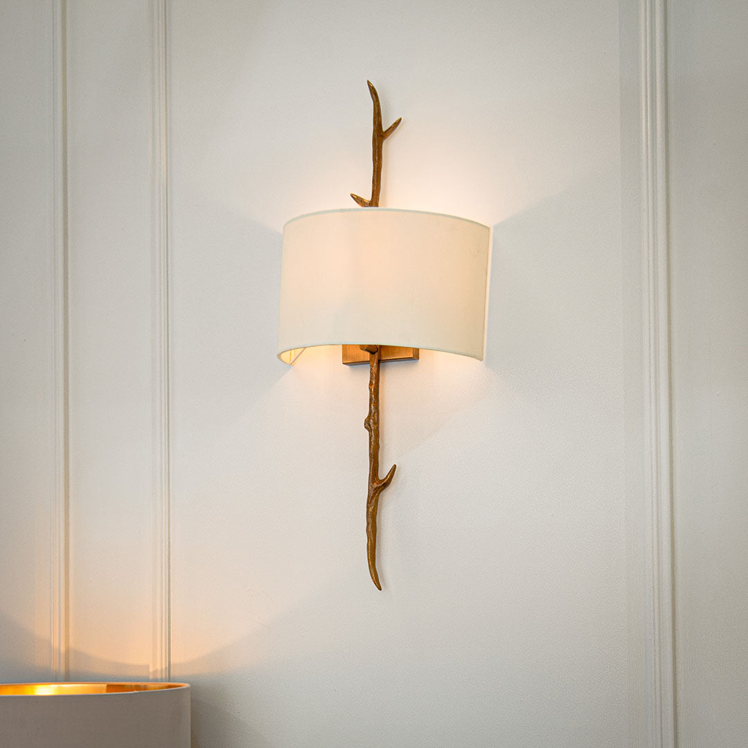 Nostelle Wall Light in brass and white — front view