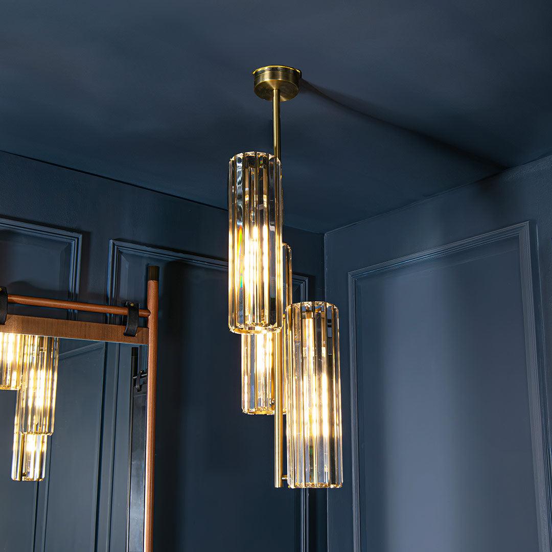 Reagan Triple Pendant Light in antique brass — alternative angle