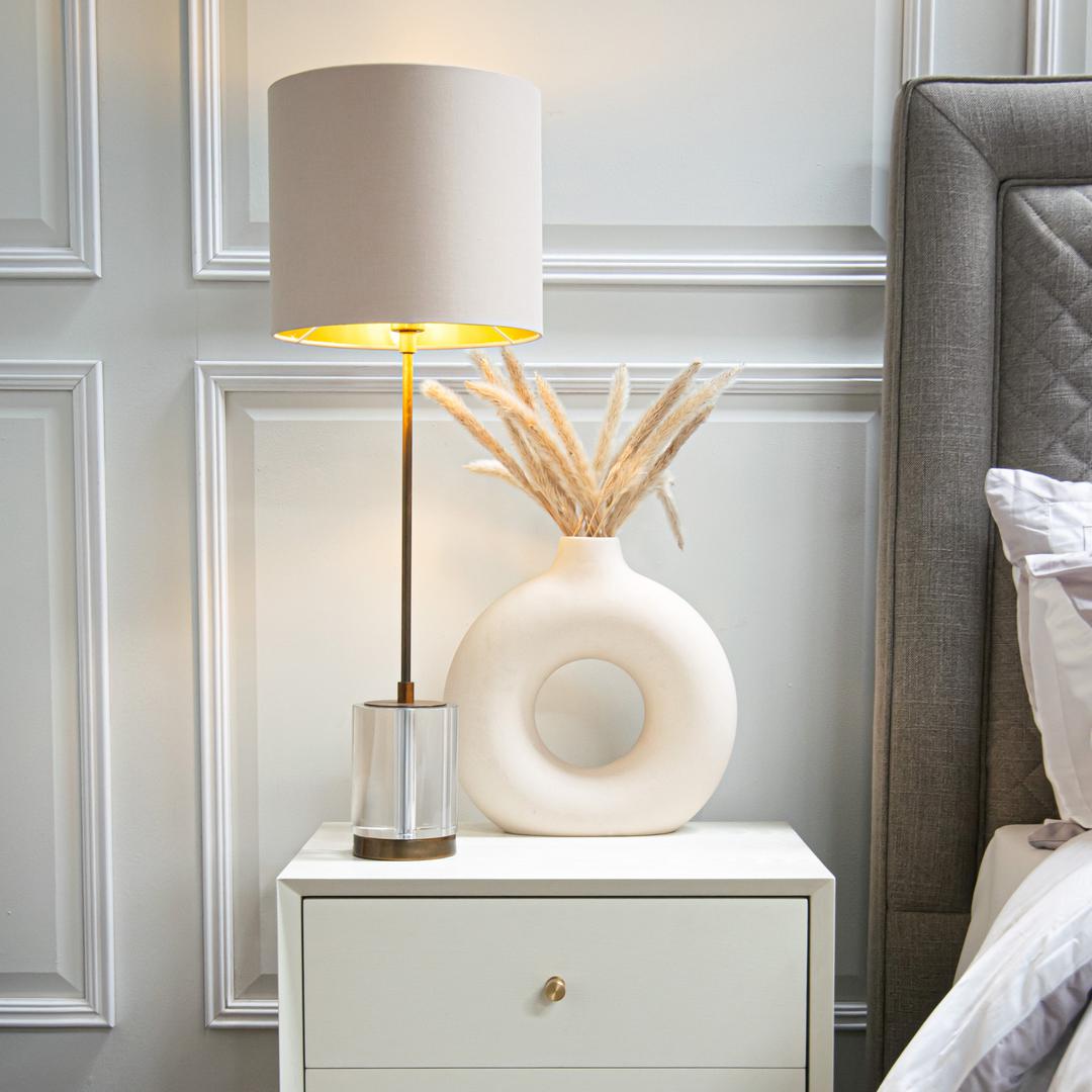 Reno Table Lamp in antique brass and soft latte — front view