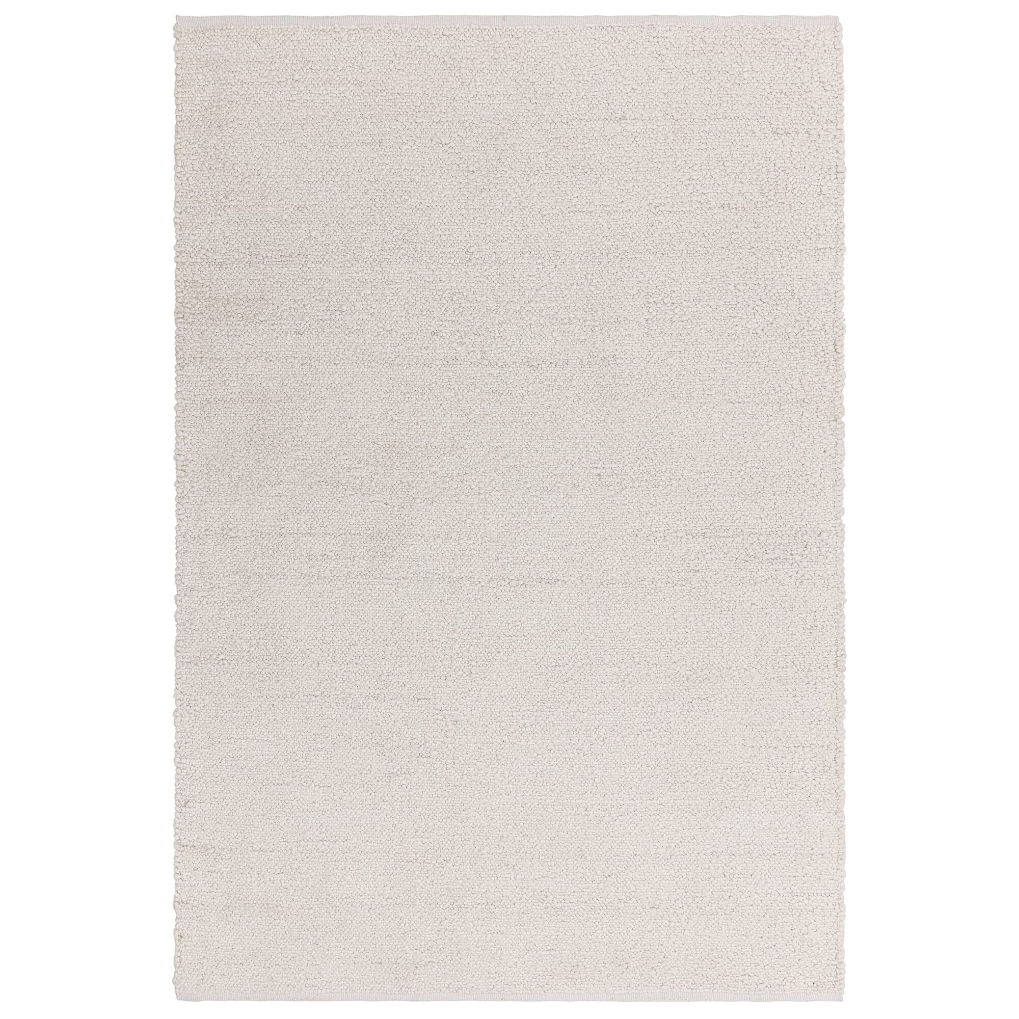 Abbus Ivory boucle rug shown from above on a plain background