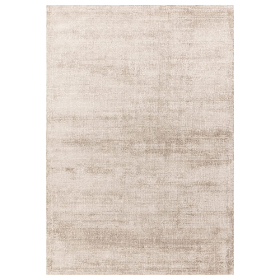 Aston Sand hand-loomed viscose rug shown from above on a white background