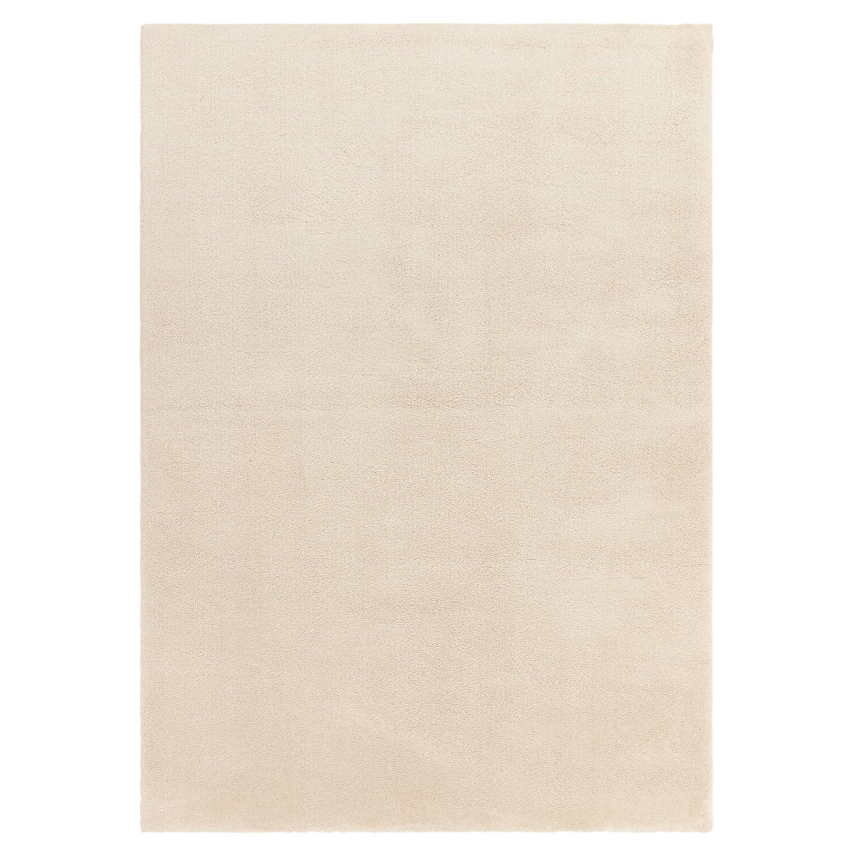 Como Ivory shaggy rug on a white background showing full size and shape
