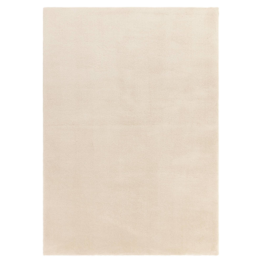 Como Ivory shaggy rug on a white background showing full size and shape