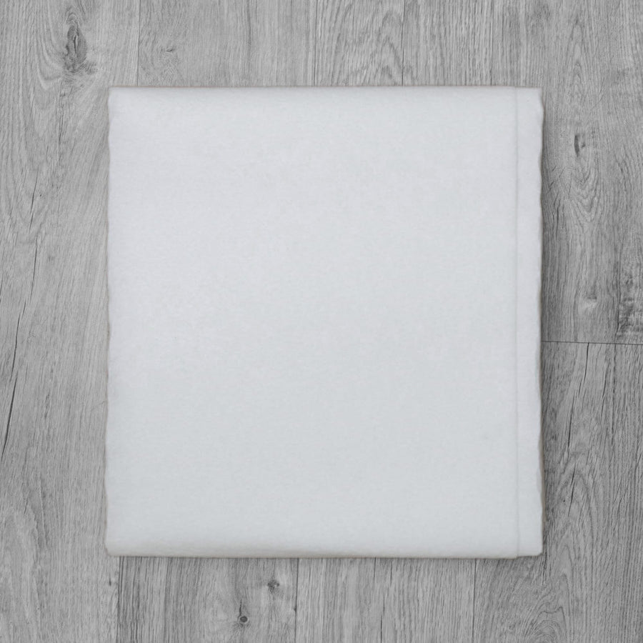 Essential anti-slip rug underlay laid flat, shown beneath a rug