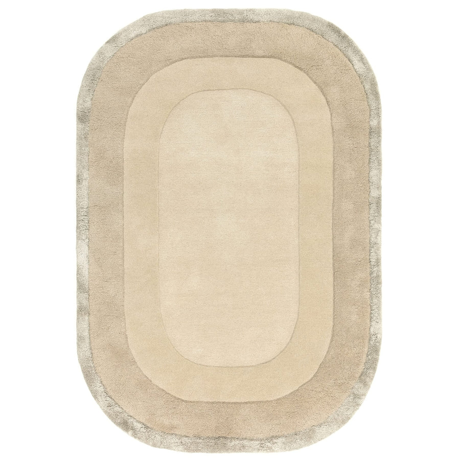 Halo Calico oval rug on a white background, showing the shaggy viscose border