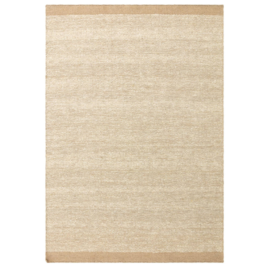 Lima Sand hand-woven wool rug on white background showing full weave and contrasting edge