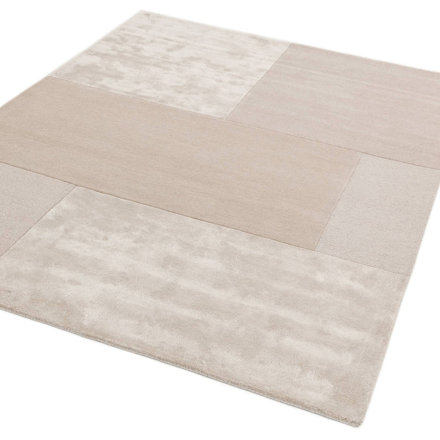 Tate Ivory hand-carved geometric wool rug on white background